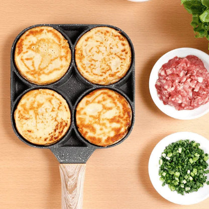 Multi-section pan from above showing 4 individual cooking compartments