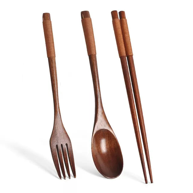 Artisan cutlery set laid on a marble surface – Zen Elegance knife, fork and spoon