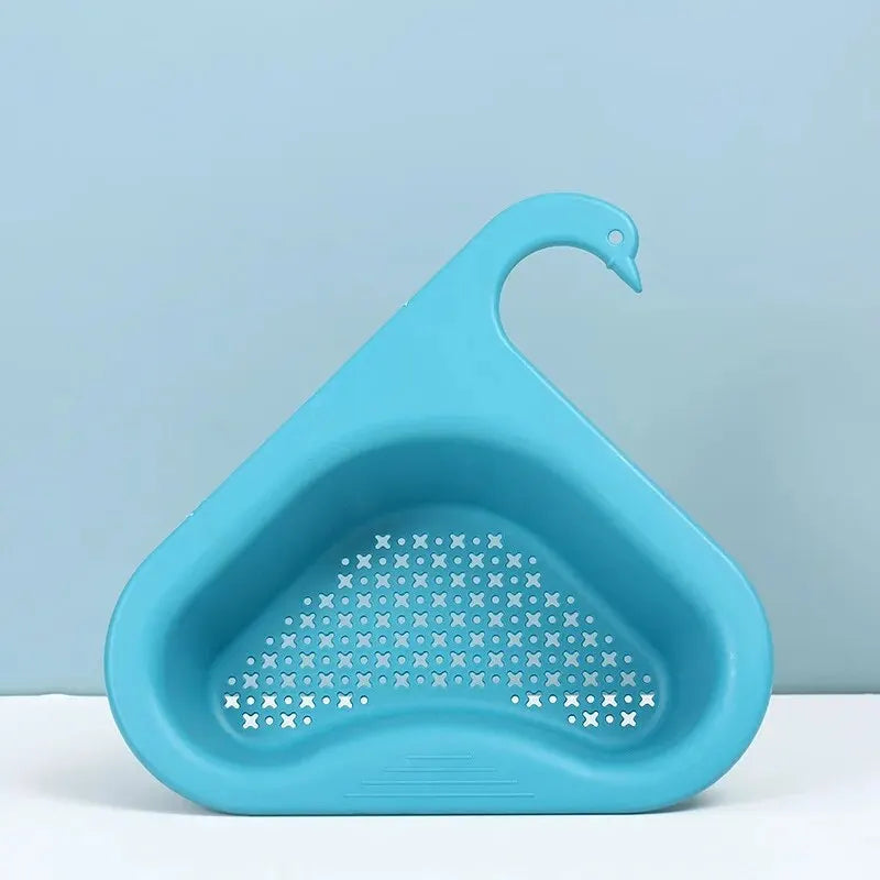 Kitchen sink organiser with brushes and soap on a white worktop