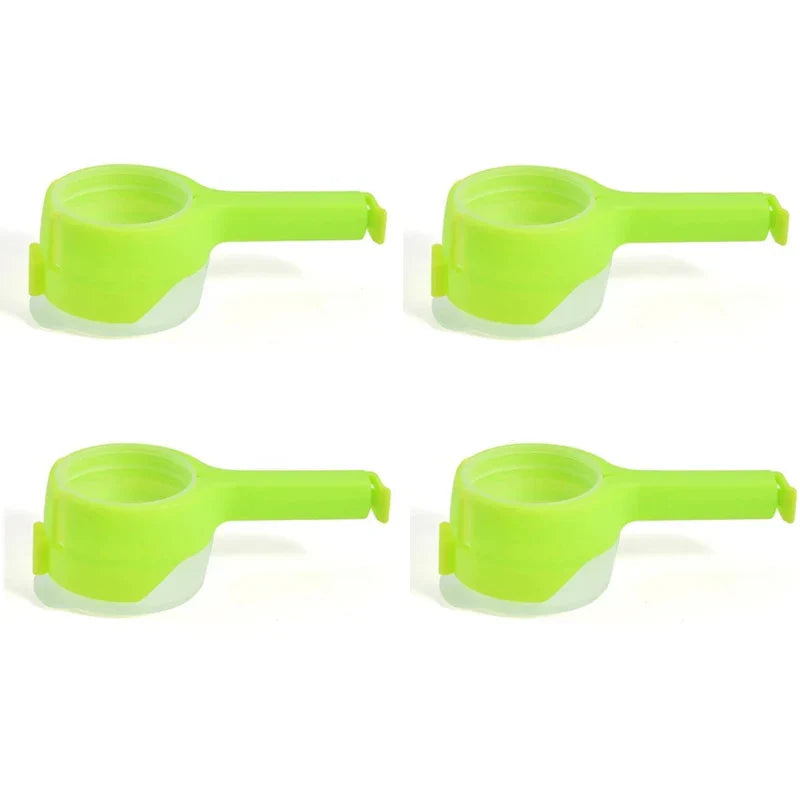 Bag sealer clips in blue attached to a flour bag – airtight kitchen accessory