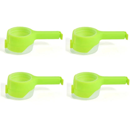 Bag sealer clips in blue attached to a flour bag – airtight kitchen accessory