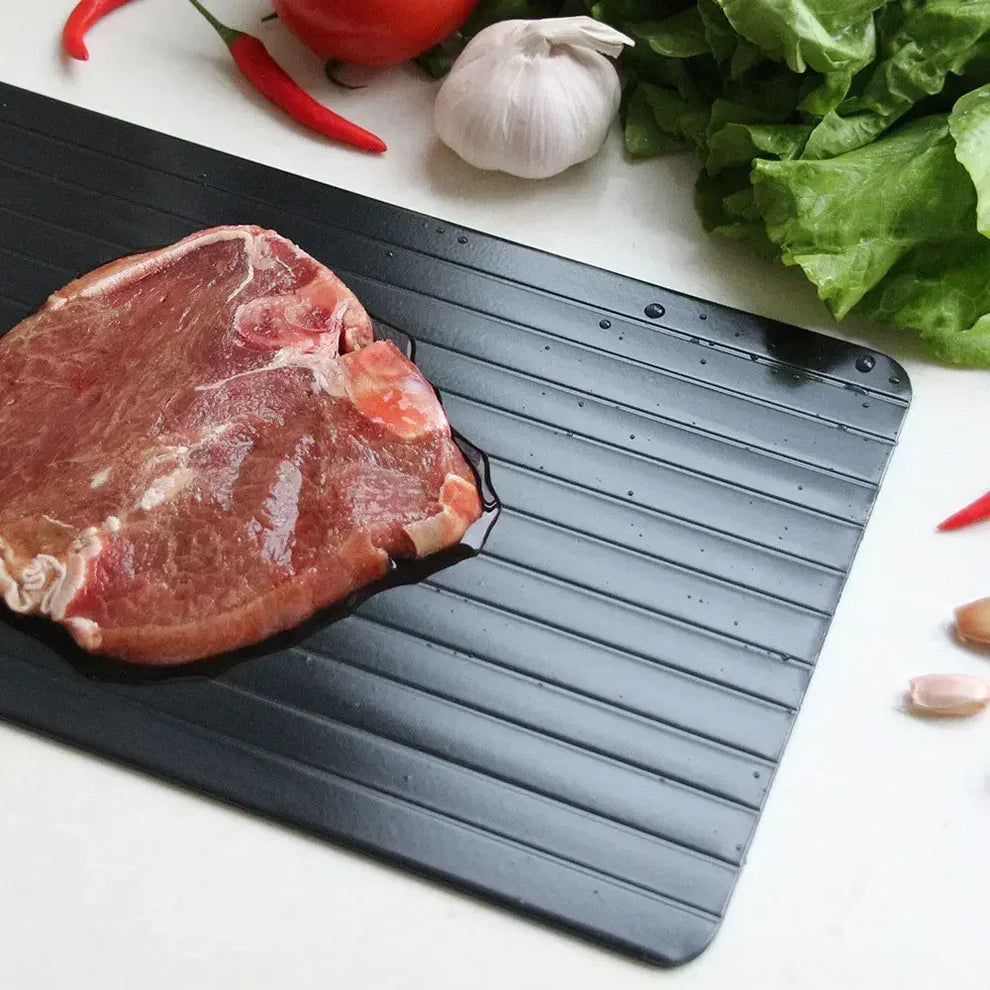 Defrosting tray close-up showing aluminium surface – speeds up natural thawing