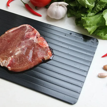 Defrosting tray close-up showing aluminium surface – speeds up natural thawing