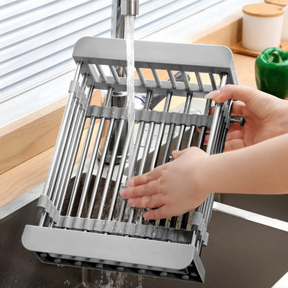 Sink drain basket fully extended holding vegetables – adjustable length organiser