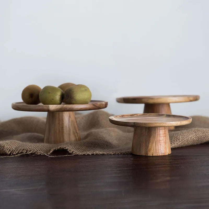Oakline wooden cake stand with a frosted cake on display – elegant kitchen centrepiece