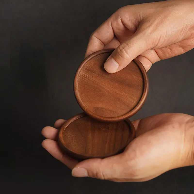 Acacia wood coasters set of 4 displayed on a wooden table – natural grain finish