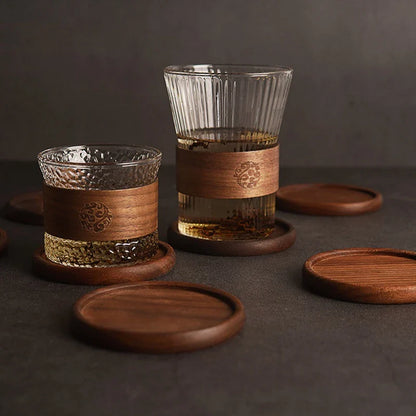 Four round acacia wood coasters stacked neatly – eco-friendly kitchen accessory
